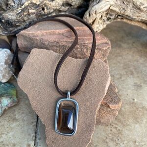 Necklace with translucent brown stone